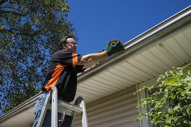 a gutter being repaired on a sunny day in Culver City, CA
